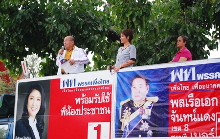 Worried about helmeted motorcyclists circling his rally, Adm. Surapol Chandang cut short his campaign speech.